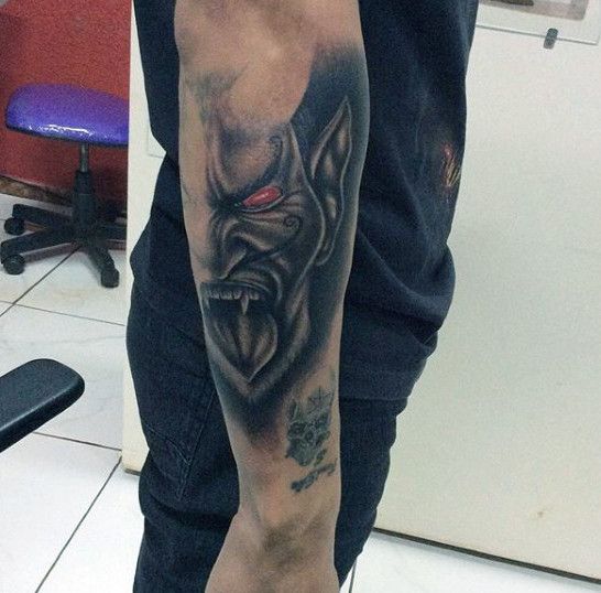 17 Devilish Angel Tattoos: Ultimate Design Ideas