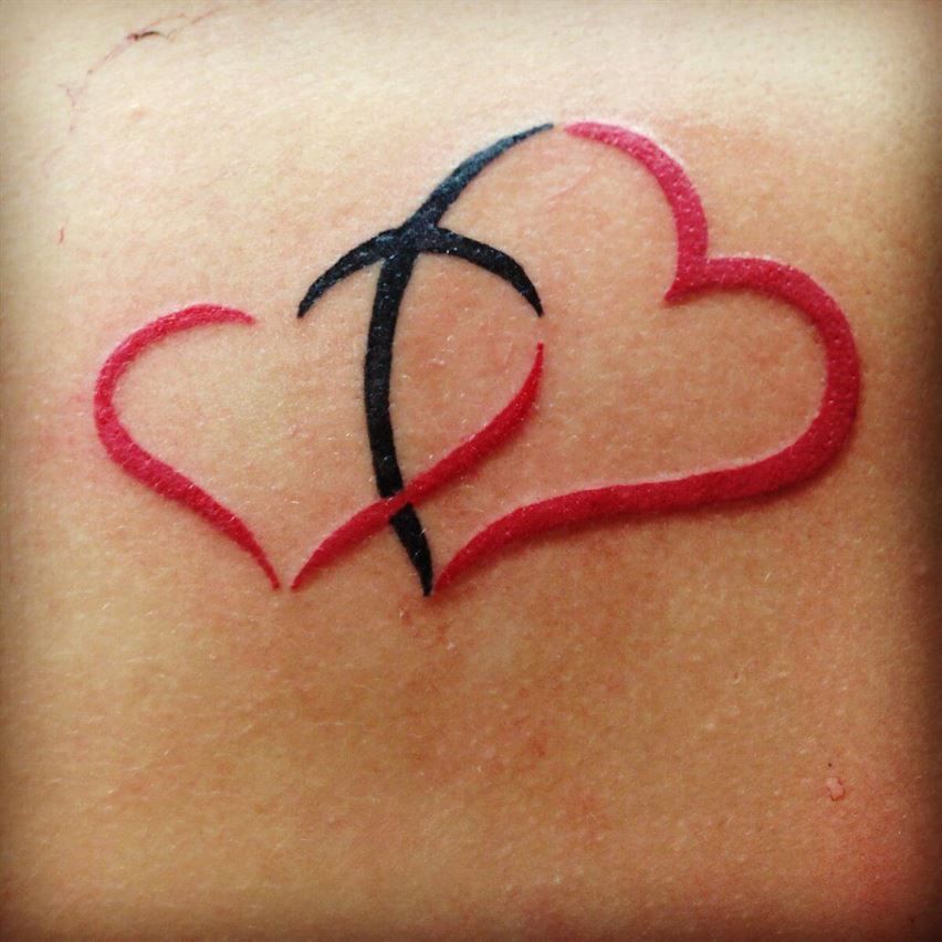 19 Pretty Cross Heart Tattoo Design Ideas 19 Pretty Cross Heart Tattoo Design Ideas